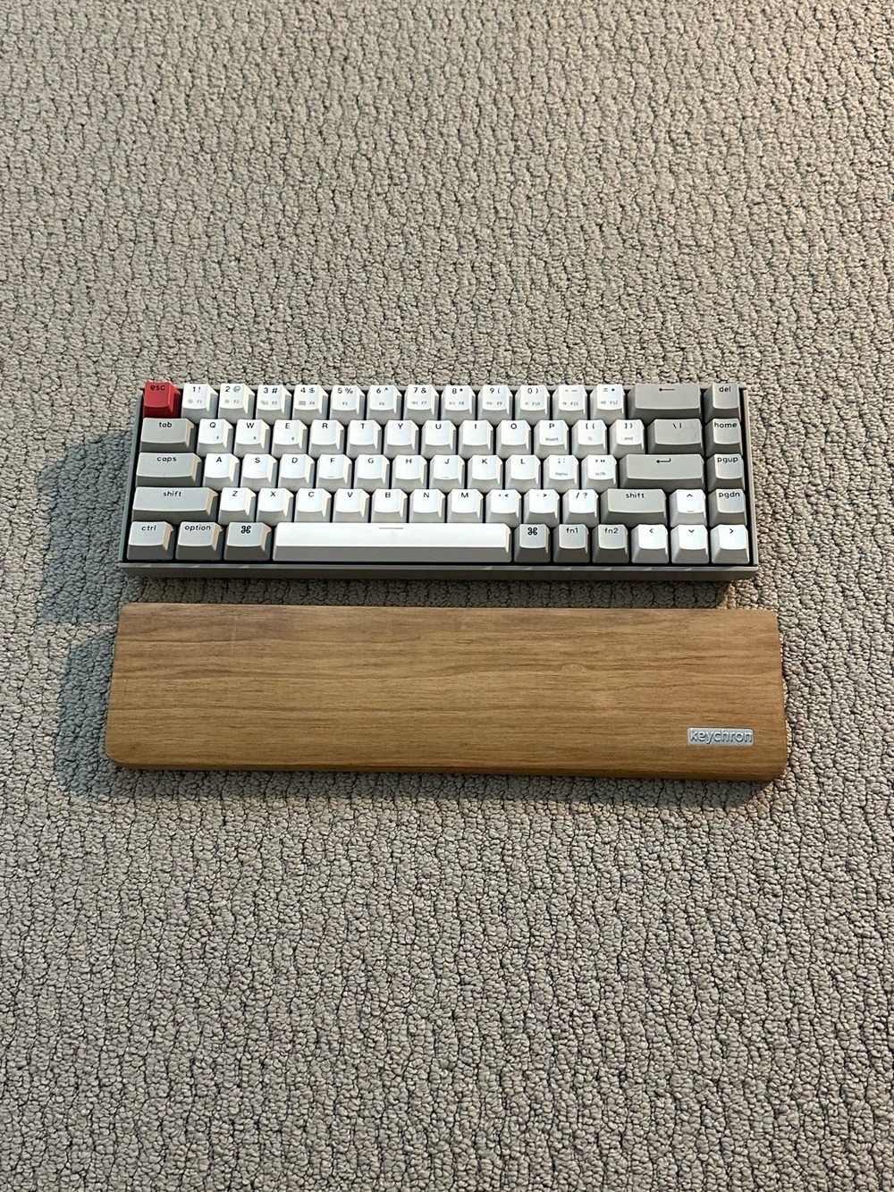 Keychron K6 mechanical keyboard with wood palm rest